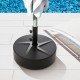 Patio umbrella base in black, 88 lbs capacity, filled with sand or water for stability, suitable for various umbrella.
