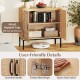 Boho storage cabinet with natural rattan doors, adjustable shelf, and metal support legs for kitchen organization.
