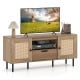 Boho TV stand with natural finish, featuring PE rattan doors, storage drawer, and six sturdy metal legs for stability.