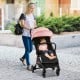 Lightweight portable stroller with adjustable backrest, 5-point harness, and large storage basket, perfect for easy.
