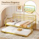 Twin daybed with curved backrest in gold, featuring a pull-out trundle and rounded arch detailing for versatile use.
