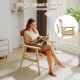 Modern accent chair with spacious backrest, rubber wood frame, and soft polyester upholstery for cozy support.