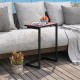 C-shaped outdoor side table with a ceramic top, featuring a retro design, perfect for patios and easy to clean.