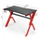 Ergonomic gaming desk with carbon fiber surface, R-shape steel frame, and cable management for organized gaming setup.