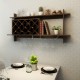 Wall mount wine rack in walnut finish, featuring a sleek shelf for decor and a glass holder for stylish wine storage.