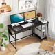 55-inch black computer desk with dual monitors, recessed charging station, and under-desk storage for organized.