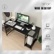 Wide black computer desk with 4 power outlets, under-desk storage, and sturdy metal frame for studying or gaming.