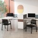 Set of 2 stackable rolling office chairs with black mesh backrest, designed for comfort and easy mobility in office.