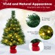 24-inch mini pre-lit Christmas tree with 35 warm white LED lights and red cloth bag base, perfect for festive tabletop.