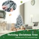 Flocked 4.5 ft Christmas tree with 757 branch tips and warm white LED lights, perfect for festive home decoration.