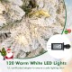 Flocked Christmas tree with 120 warm white LED lights, featuring a stable metal stand and realistic branch tips.
