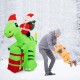 Inflatable 8-foot dinosaur with Santa and gift boxes, perfect for outdoor Christmas decoration.