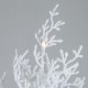 Flocked branches of a 6-foot artificial Xmas tree with 300 LED lights, ideal for festive home decoration.