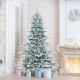 Snow flocked 7 feet artificial Christmas tree with cool white LED lights, perfect for festive home decor.