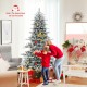 Snow flocked 7 feet artificial Christmas tree with cool white LED lights, perfect for festive home decoration.