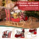 Christmas metal sleigh decoration in vibrant red with black and gold scrollwork, featuring a 2-tier storage shelf for.