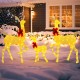 Lighted family deer set with 221 LED lights, featuring a sturdy metal frame and decorative bows for festive outdoor.