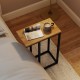 C-shaped end table with a natural wood top and sturdy metal frame, perfect for a living room or bedroom use.