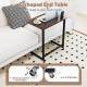 C-shaped end table in rustic brown with wheels, featuring a spacious tabletop and built-in phone slot for versatile use.