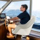 Captain bucket seat in white waterproof PVC leather, designed for comfort and support while boating.