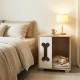 Wooden cat condo side table with bone-shaped window, natural finish, and sturdy metal legs for stylish pet comfort.