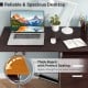 Folding computer desk with spacious brown desktop, three drawers, and wheels for easy movement in home office.