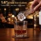Clear 1.6-inch ice cubes produced by the countertop maker, ideal for chilling drinks without dilution.