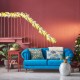 Bright 9 feet pre-lit artificial Christmas garland with 50 LED lights, featuring snow flocked appearance and lush white.