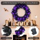 24-inch pre-lit Halloween wreath with 35 purple LED lights, featuring 179 black tips for a spooky festive atmosphere.