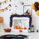 Lush black Halloween garland with 50 purple LED lights, ideal for creating a captivating festive atmosphere anywhere.