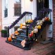 Pre-lit black Halloween garland with 50 purple LED lights, perfect for festive decoration and creating a spooky.