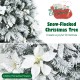 Snow-flocked 6ft Christmas pencil tree with white berries and poinsettia flowers, perfect for festive holiday decor.
