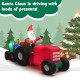 Santa Claus on a tractor with gifts, 9 feet long, bright LED lights, perfect for festive outdoor holiday decorations.