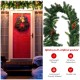 9FT pre-lit artificial Christmas garland with red berries and pine cones, perfect for indoor or outdoor holiday.