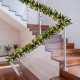9FT pre-lit artificial Christmas garland with red berries and LED lights, perfect for indoor or outdoor festive.