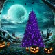 Black artificial Christmas Halloween tree with purple LED lights, highlighted against a spooky backdrop of carved.