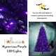 Black artificial Christmas Halloween tree with purple LED lights, 6ft tall, perfect for spooky holiday decorations.