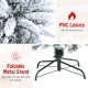 Close-up of snow-flocked leaves on a 7.5' artificial Christmas pencil tree with a foldable metal stand for stability.