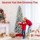 Snow-flocked 7.5' artificial Christmas pencil tree with a decorative red base, perfect for creating a festive.