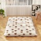 Foldable full-size futon mattress with bear pattern, polyester cover, ideal for camping or as a play mat.