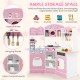 Corner wooden play kitchen in pink with coffee machine, slide, and ample storage for toys and accessories.