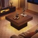 Rustic brown coffee table with LED lights, spacious surface, and modern design, perfect for living room ambiance.
