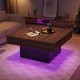 Rustic brown coffee table with LED lights, spacious surface, and remote control for dynamic mood settings.