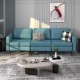 Convertible blue leather 3-seat sofa with magazine pockets and USB ports, featuring removable cushions and a modern.