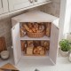 Corner bread box in white bamboo with dual-layer design, storing various baked goods for kitchen organization.