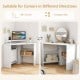 Compact white corner computer desk with triangle design, storage shelves, and cable management for versatile workspace.