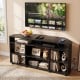 Corner TV stand in black for TVs up to 55 inches, featuring ample storage, adjustable shelves, and a charging station.