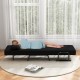 Convertible sleeper bed in black, featuring a thick cushion and adjustable backrest, perfect for lounging or sleeping.