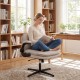 Criss Cross ergonomic office chair in beige with flip-up arms, padded seat, and adjustable height for home office.