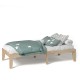 Twin size wooden slats bed frame in natural finish with teal star-patterned bedding, ideal for comfortable sleep.